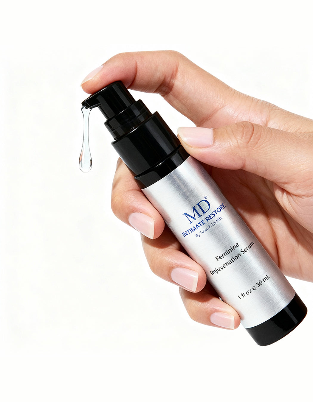 Hand applying MD Intimate Restore serum to support anti-aging care for sensitive intimate skin with lightweight formula