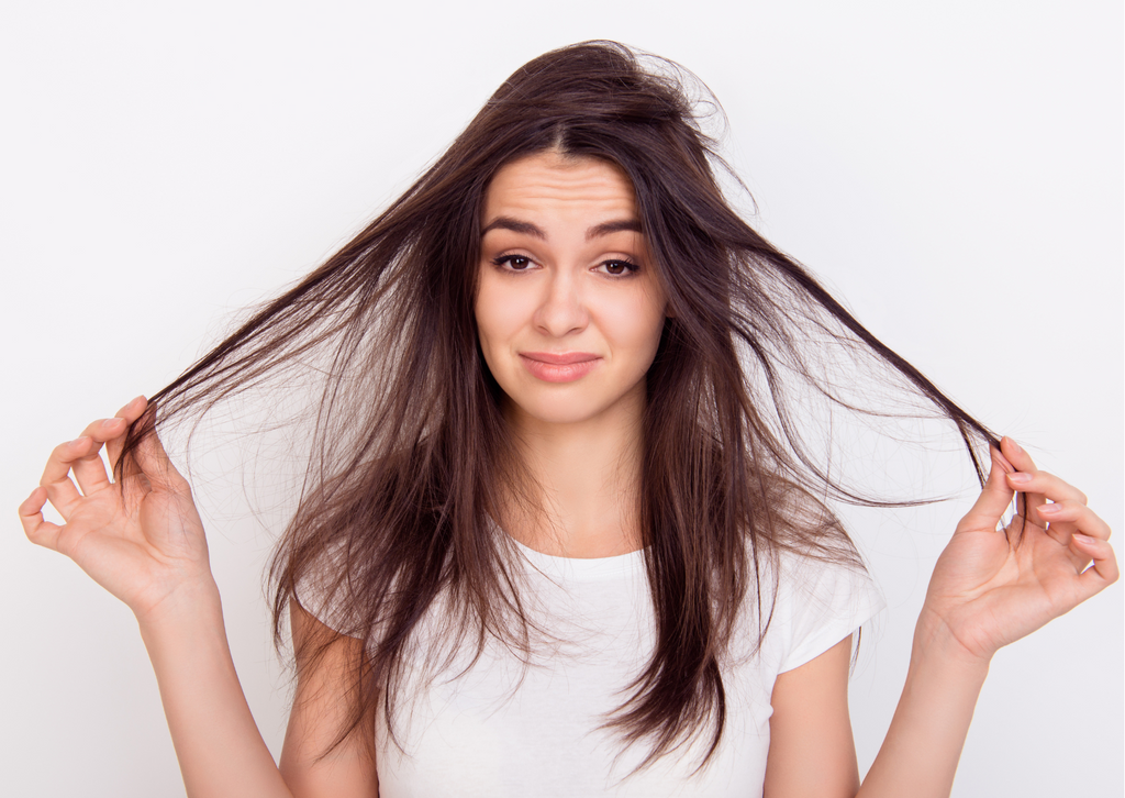 How does vitamin E benefit hair health?